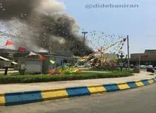 آتش در پاساژ رضوان اهواز / در حال گسترش است و صدای انفجار به گوش می‌رسد