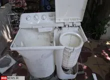 گیر افتادن پسر بچه بازیگوش در ماشین لباسشویی