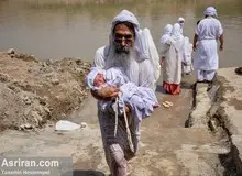 غسل تعمید کودکان مندایی در اهواز +تصاویر 