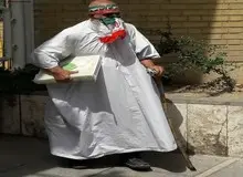 داوطلب کفن‌پوش انتخابات ریاست جمهوری در وزارت کشور حاضر شد+عکس 