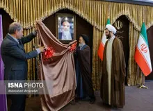 کتاب خاطرات روحانی در دستان ربیعی+ عکس
