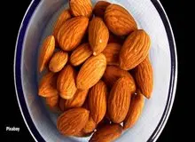 حتی در خوردن بادام هم زیاده روی نکنید/شش عارضه مصرف بیش از حد بادام درختی