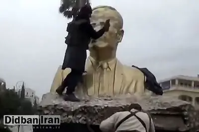 سرنگونی مجسمه حافظ اسد در ساحل طرطوس+فیلم