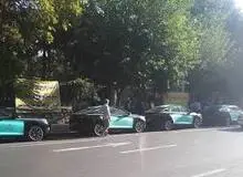 تجمع رانندگان تاکسی‌های برقی در مقابل شورا و شهرداری تهران
