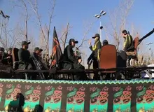 انتقال پیکر شهدای آتش نشان به آمبولانس های بهشت زهرا مستقر در میدان هفت تیر

