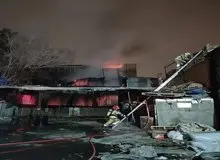  آتش‌سوزی در یک کارگاه تولید کفش در خیابان خیام تهران 