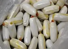 بلع مواد مخدر در مشهد، قاچاقچی ۱۸ ساله را تا یک قدمی مرگ کشاند