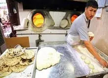 گزارش تصویری / پخت نان لواش در کویت 