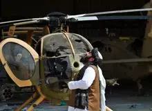 بازی کردن اعضای طالبان با هلیکوپتر آمریکایی/FILM
