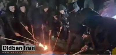 معترضان گرجی پرچم روسیه را به آتش کشیدند+فیلم 