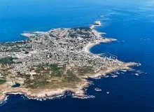 ماجرای نصب جنجالی یک بنر با نشانه‌های چینی در جزیره کیش چه بود؟/ عکس
