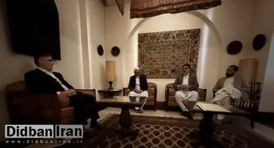 ماجرای عکس جنجالی فرزین با صرافان هرات چه بود؟