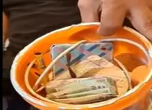 تمسخر ریال ایران توسط فروشنده عراقی/ پول ایرانی را باید سطل آشغال انداخت!+فیلم 