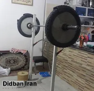 تصویری دردناک از دختران وزنهبردار/ تمرین با سیمان و لاستیک موتورسیکلت در خانه!